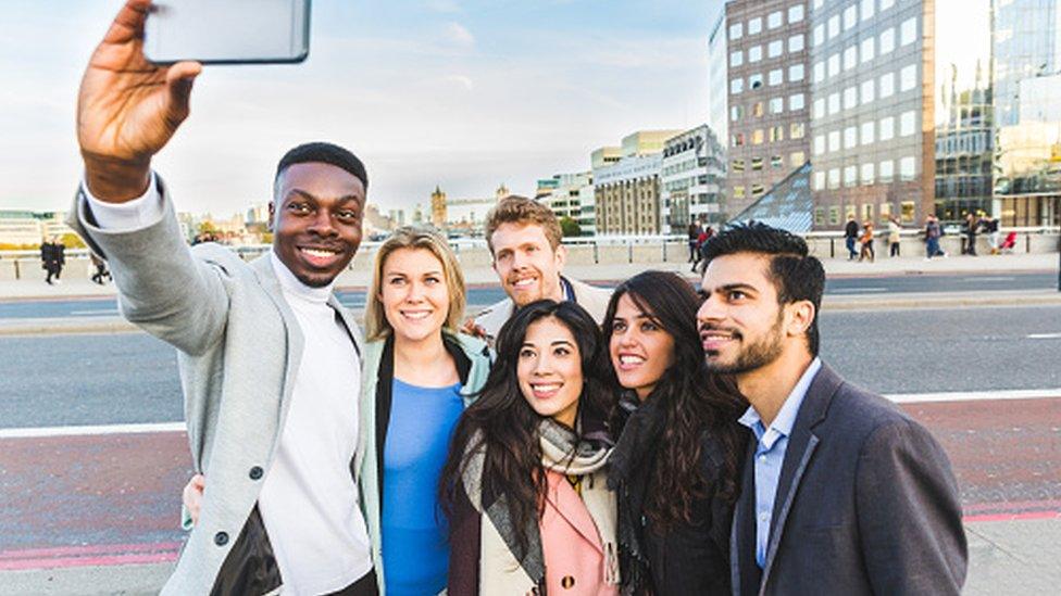 Young people taking a selfie