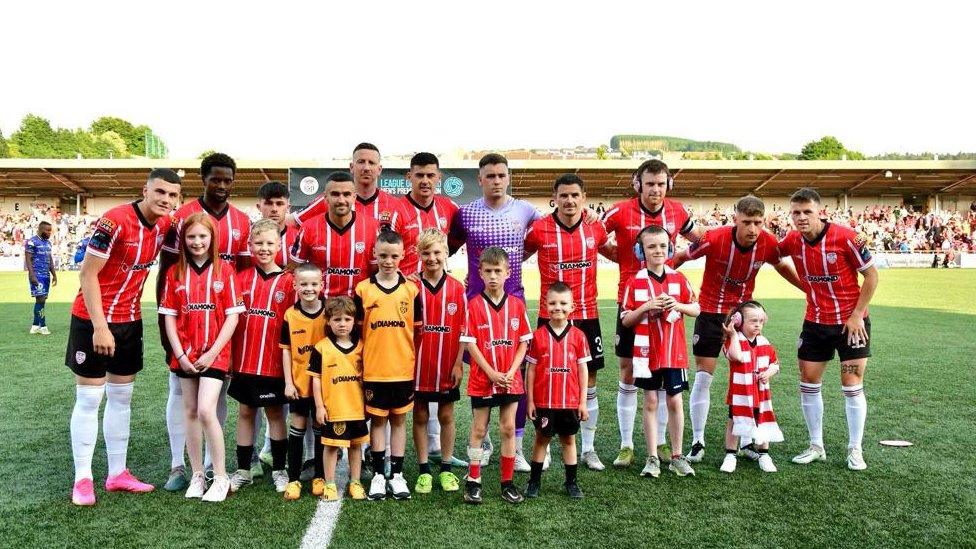 Derry Cutty football club with pupils