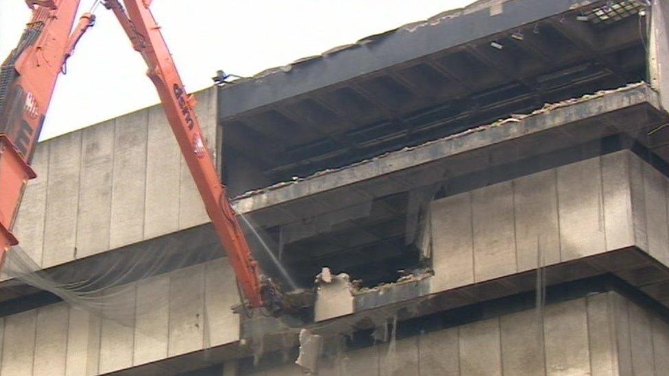 Demolition work begins