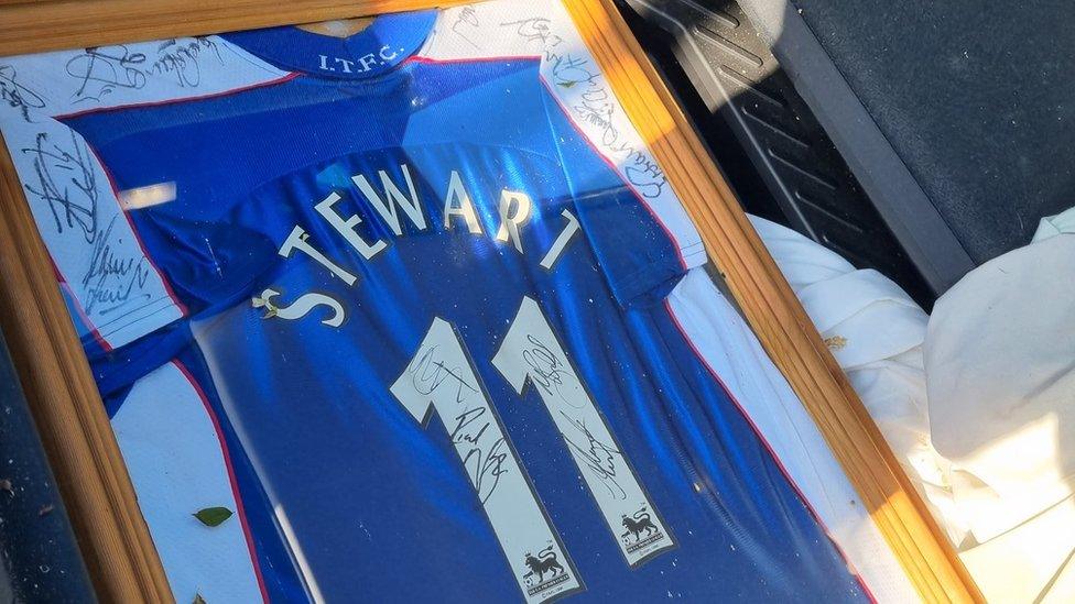 A framed and signed Ipswich Town Shirt