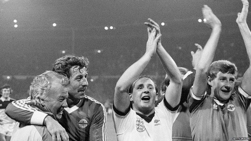 Nigel Worthington (far right) celebrates with the Northern Ireland team following the 0-0 draw against England at Wembley in November 1985