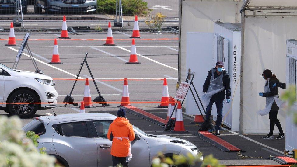 Cars at a drive-through testing centre