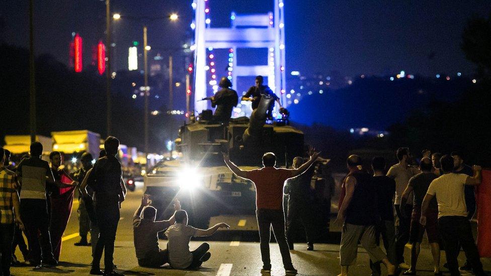 Turks take over a tank near the Fatih Sultan Mehmet bridge in Istanbul on July 16