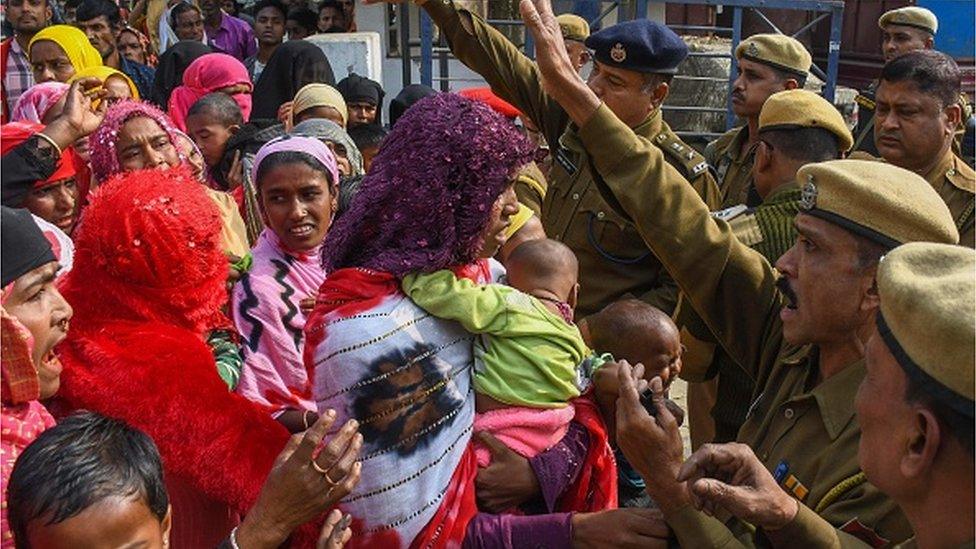 Relatives of people arrested by police for being allegedly involved in child marriages, during Assam government's state-wide crackdown on child marriages, react after police baton charge to control to protesting relatives outside Mayong police station in Morigaon district of Assam on February 4, 2023.