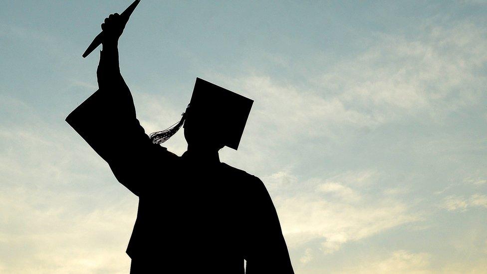 Silhouette of a graduate