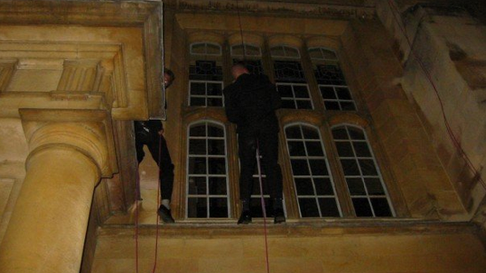 Tom Whipple abseiling into Trinity College