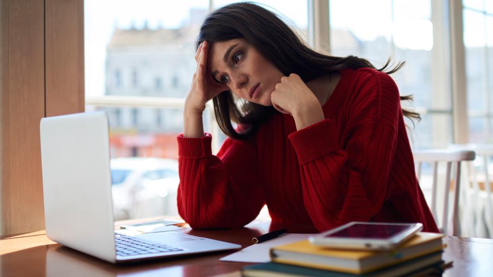 Stressed female student posed by model