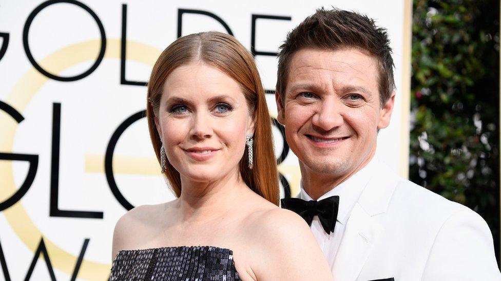 Amy Adams and Jeremy Renner