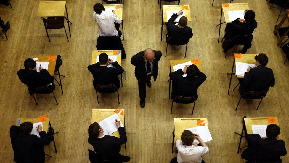 pupils sitting in exam room