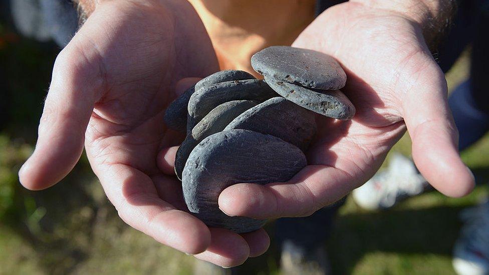 Stones from skimming Easdale