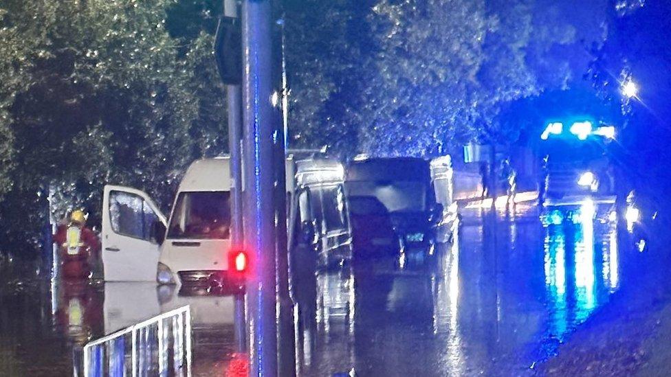 Emergency services attending a flooded road in Bishop's Stortford