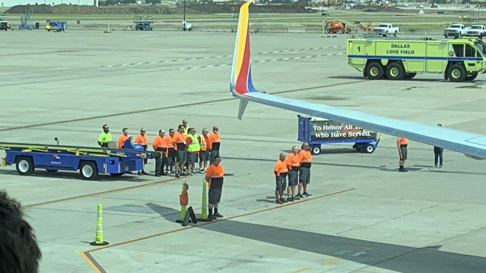 Airport officials standby as Col Knight arrives