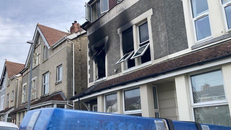 Fire-damaged exterior of building