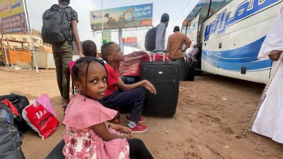 A girl waits in Khartoum