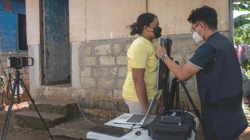 A woman in the Philippines being X-rayed for TB