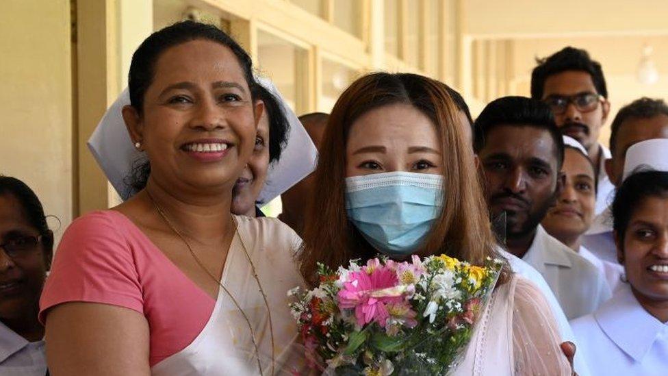 Pavithra Wanniarachchi pictured with a patient who recovered from the virus