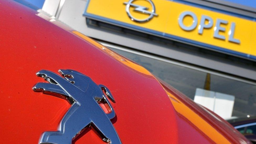 Peugeot and Opel logos