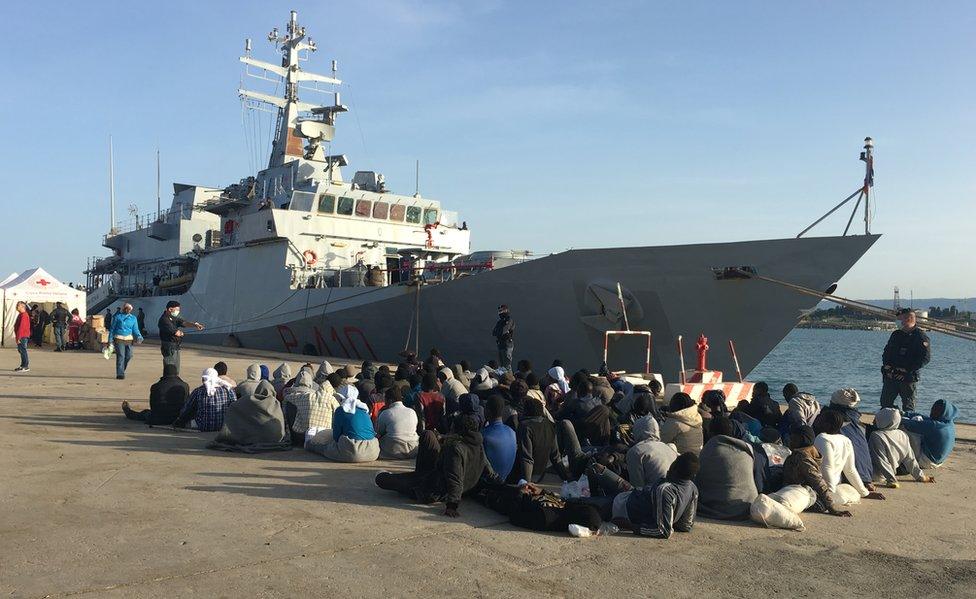 New arrivals wait after arrival in Italy