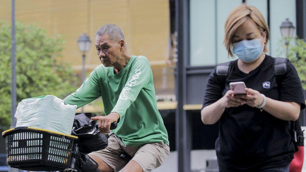 Woman wearing face mask in Singapore