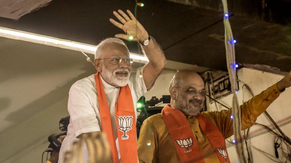 Narendra Modi waves to the supporters from the first BJP Party Office May 26, 2019 in Ahmedabad, India