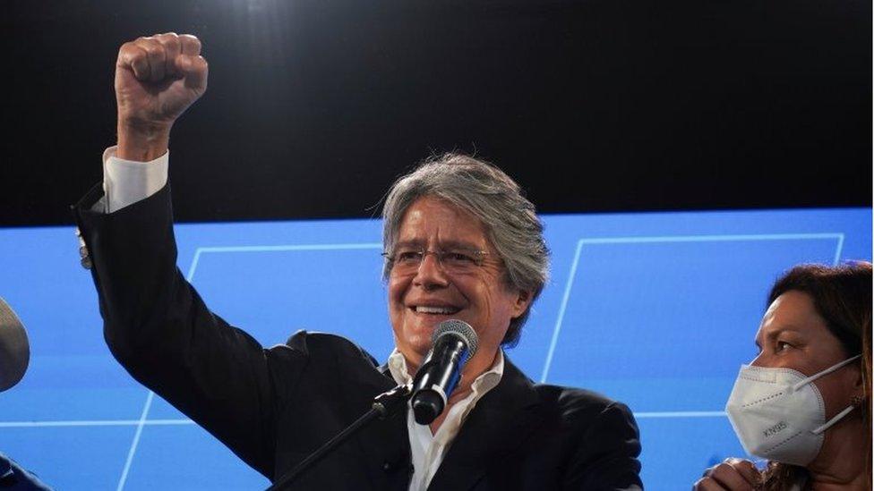 Guillermo Lasso gestures at a news conference during the presidential election, in Guayaquil, Ecuador February 7, 2021