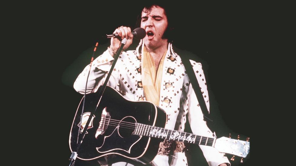 Elvis Presley with the Gibson Dove acoustic guitar