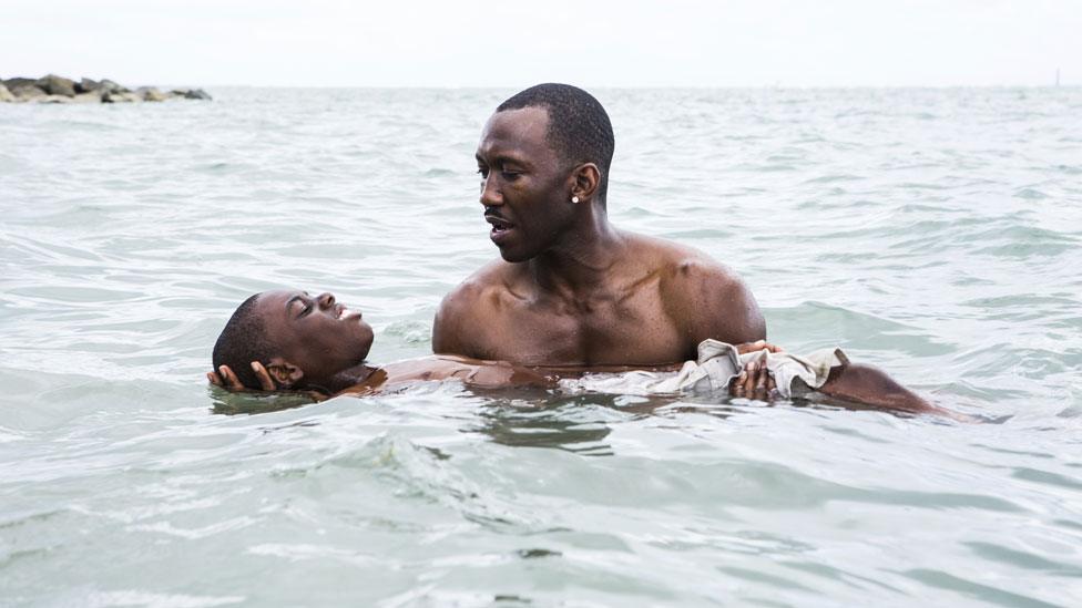 Alex Hibbert and Mahershala Ali in Moonlight