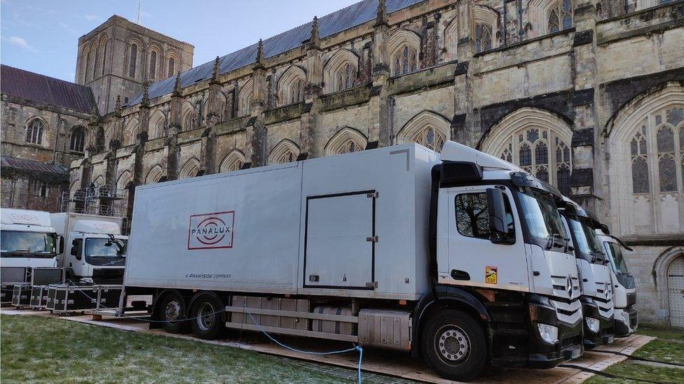 Location trucks at Winchester Cathedral