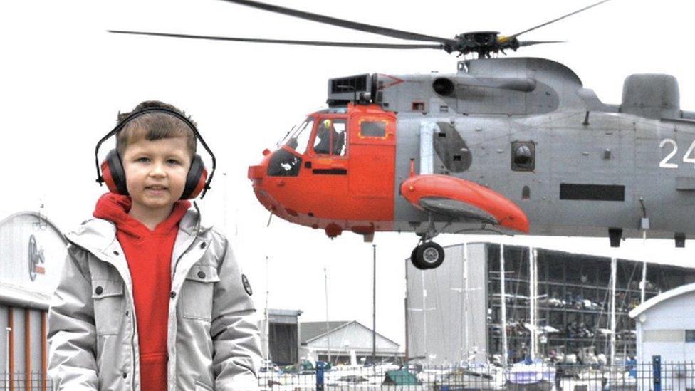 Finley Eckersley with Sea King helicopter