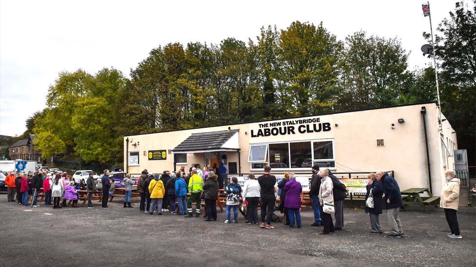 Queue of people outside Stalybridge Labour Club, Manchester