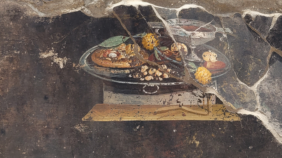 A newly-excavated fresco in Pompeii depicting a flatbread which could be the precursor to the modern-day pizza