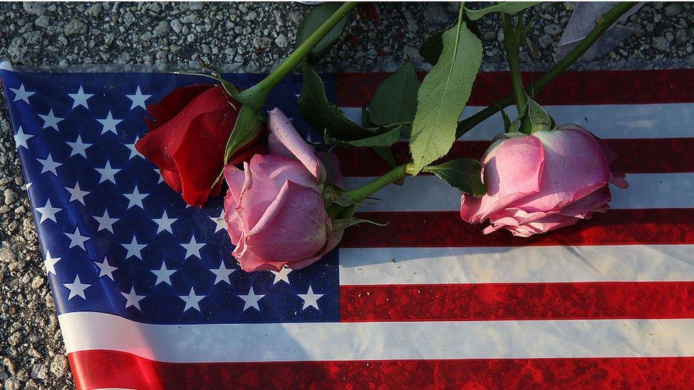 Flowers left near the Orlando nightclub where a terrorist attack took place in June 2016