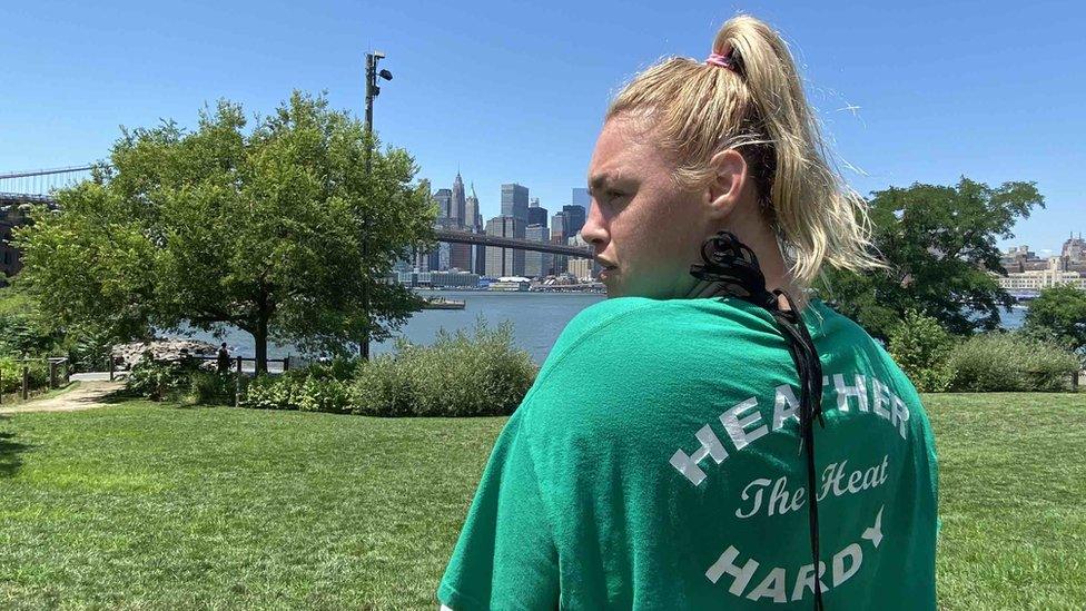 Heather 'The Heat' Hardy tries to encourage passers to workout with her