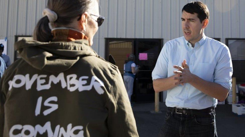 Democratic candidate for California's 10th Congressional District Josh Harder talks with a supporter