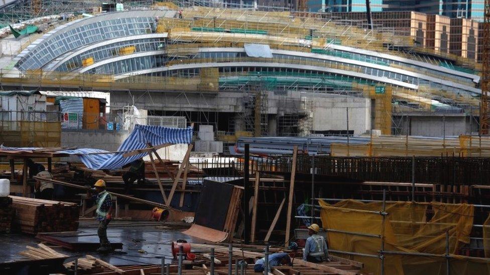 Workers on the West Kowloon rail terminus