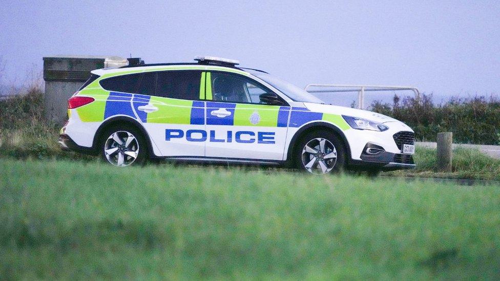 A police car at the scene in Ovingdean