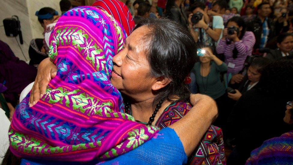 Human Rights activist Rosalina Tuyuc embraces a victim of sexual violence in court in Guatemala city on 26 February, 2016