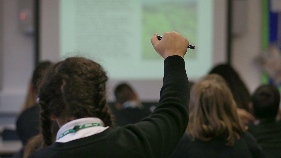 Student raising hand