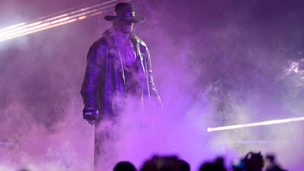 The Undertaker making one if his entrances