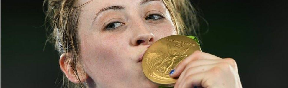 Great Britain"s Jade Jones poses with her gold medal on the podium after the womens taekwondo event in the -57kg category as part of the Rio 2016 Olympic Games, on August 18, 2016, at the Carioca Arena 3, in Rio de Janeiro