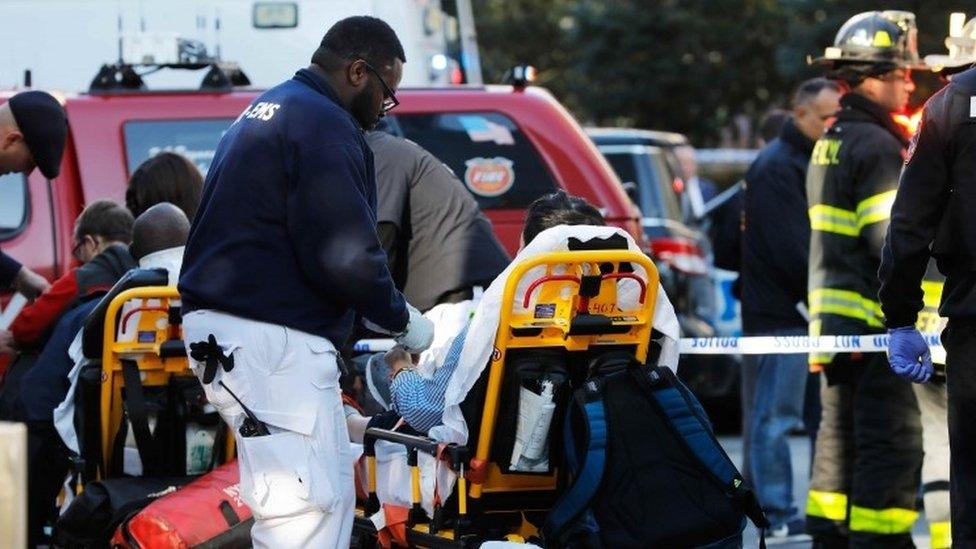 medics treat an injured person