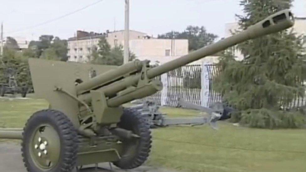 A still image taken from a video shows the Russian ZiS-3 field gun