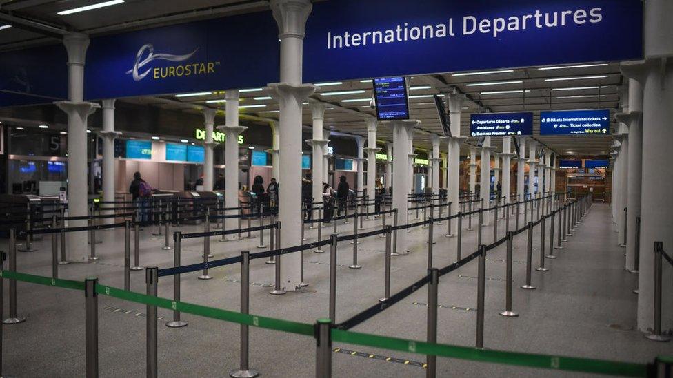 Empty lanes are seen at the Eurostar at St Pancras train station