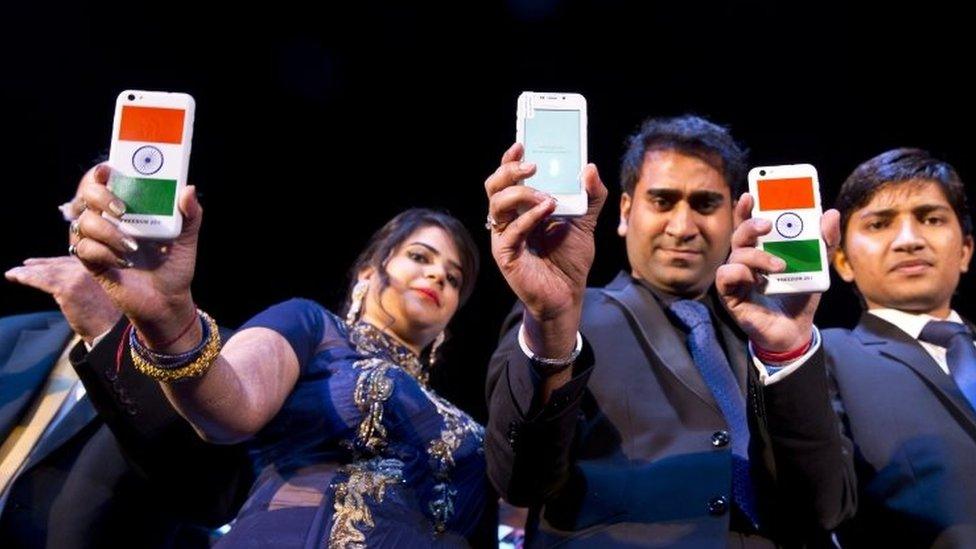 A Freedom 251 smartphone, which is to be priced at Indian Rupees 251 or USD 3.6 approximately, is shown during its release by officials of Ringing Bells Pvt. Ltd. in New Delhi, India, Wednesday, Feb. 17, 2016