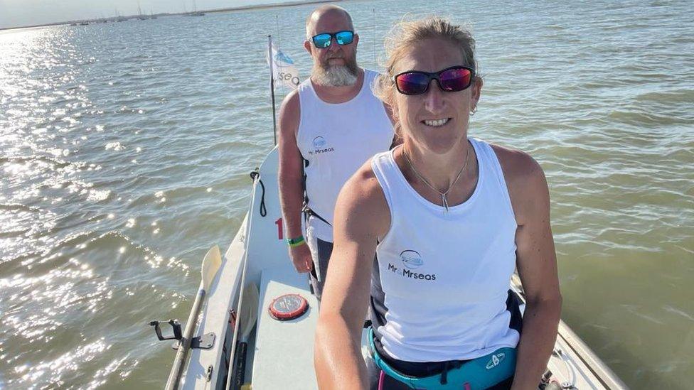 Nina and Simon Crouchman on a boat on the water