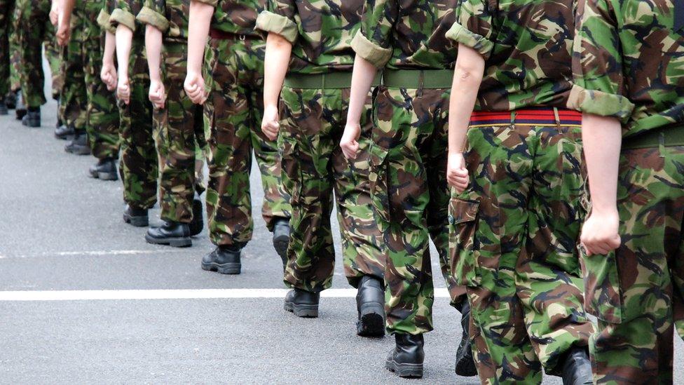 Members of the military march