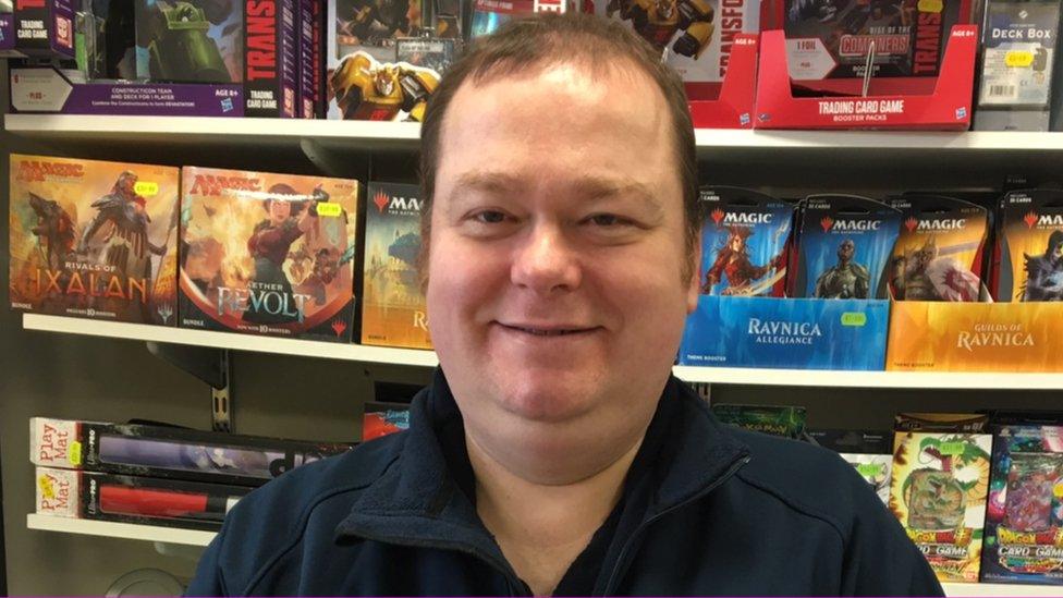 Paul Thomas in his comic and games shop