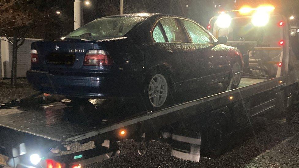 A car on a tow truck