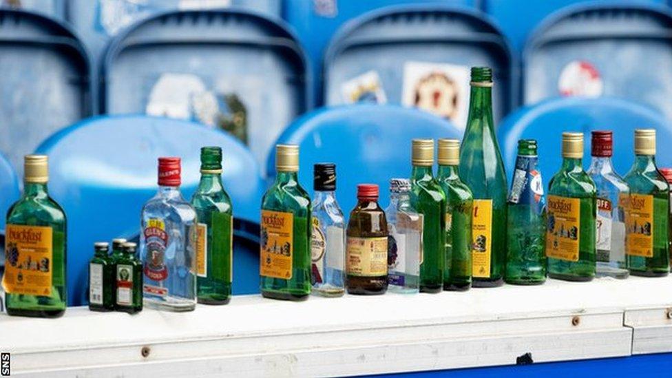 Discarded bottles at Ibrox after the match