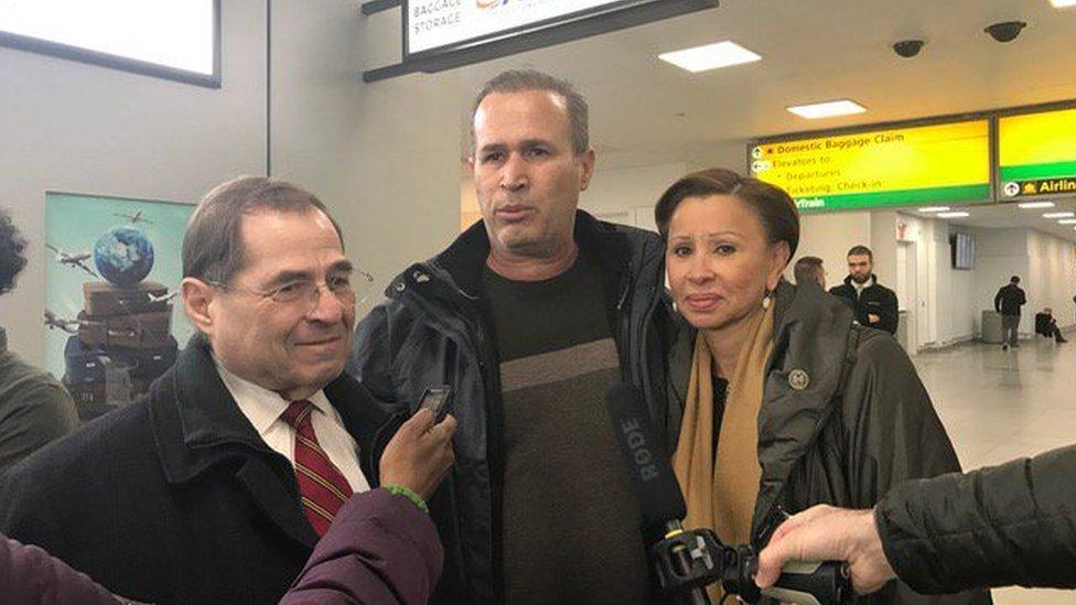 Iraqi refugee Haneed Khalid Darweesh, centre, with Representatives and Nydia Velazquez.